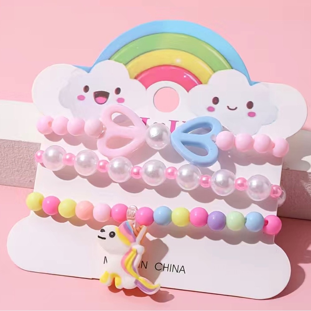 - Girls multi color unicorn bracelet set. New